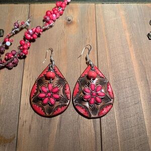 Tooled leather with fuchsia pink flowers